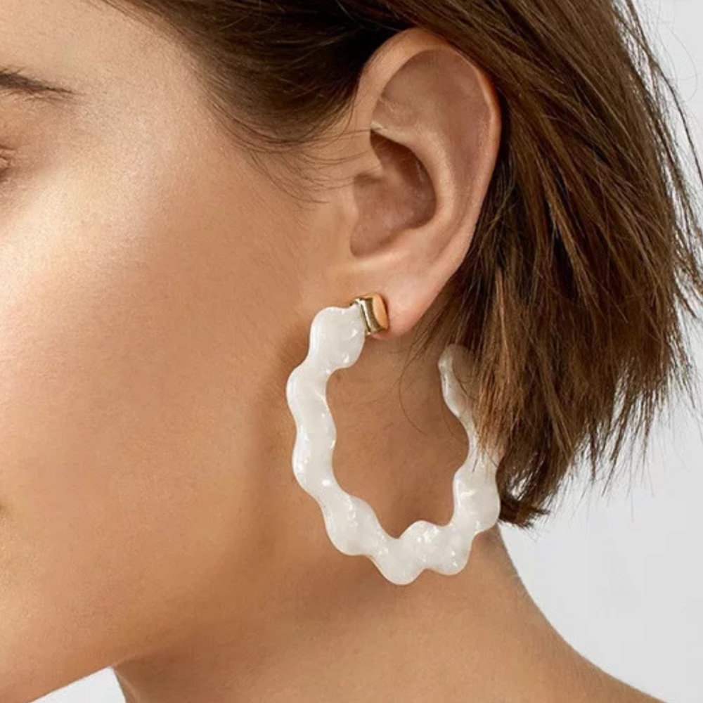 White acrylic wavy hoop earrings, rubber posts